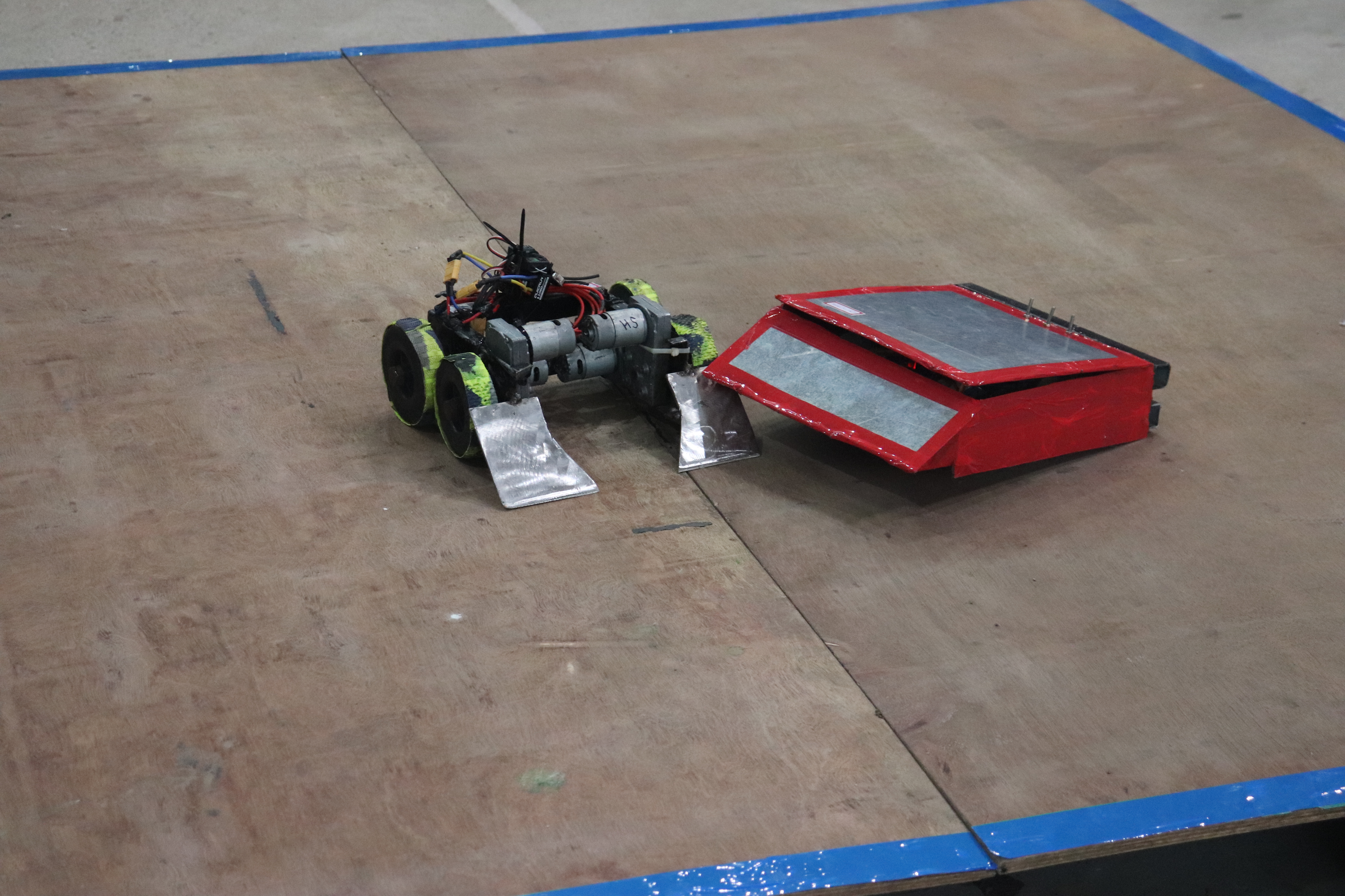 Bots colliding in combat arena creating sparks